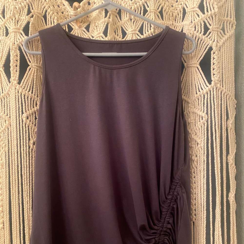 Never worn. Grey